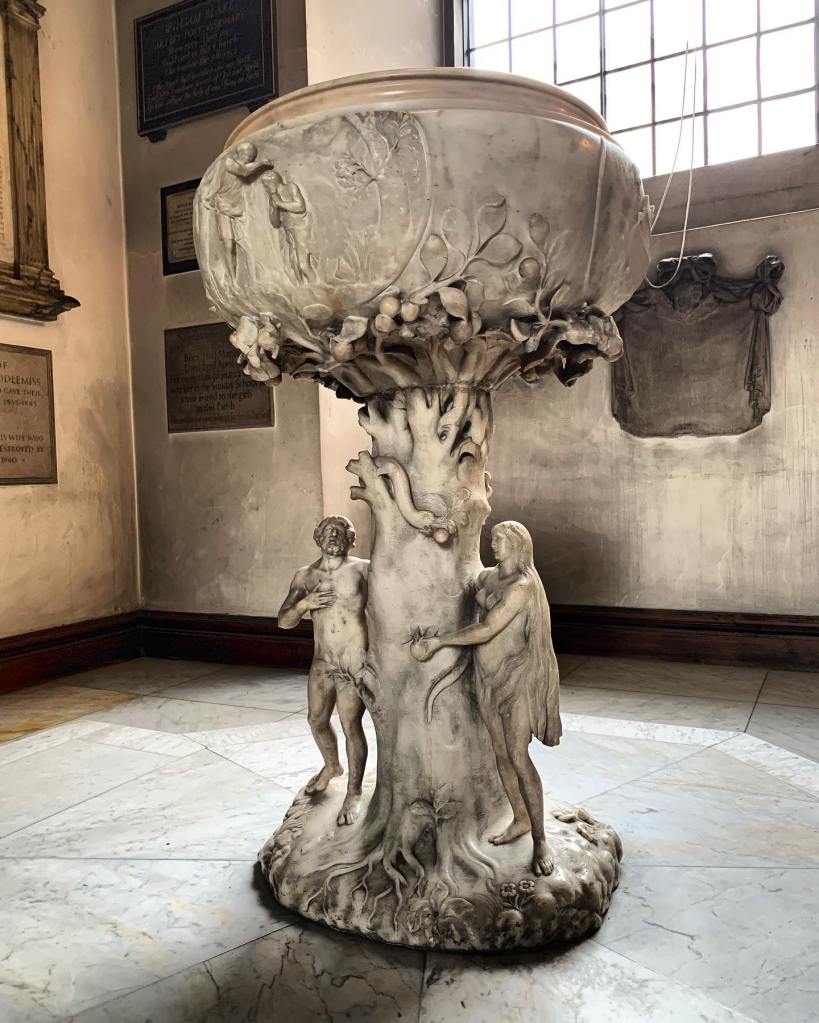 Workshop of Grinling Gibbons (1648–1721)? A white marble baptismal font stands in St James’s Piccadilly, London.