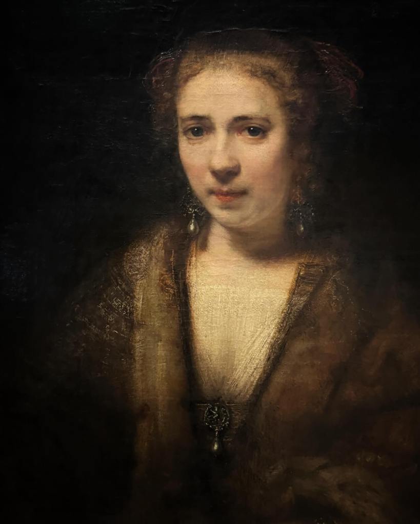 Attributed to Rembrandt Harmenszoon van Rijn( 1606-1669) or his Studio, Young woman in fantasy costume, first half 1650s, Oil on canvas, 74.0 x 61.0 cm, The Louvre, Paris