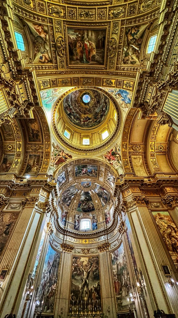 The high altar, designed by Carlo Fontana (1634–1714), frames Mattia Preti’s frescoes depicting the martyrdom and burial of Saint Andrew.